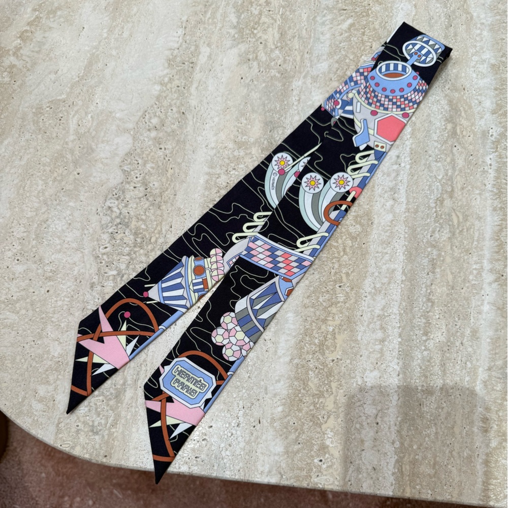 Hermès Odyssey Silk Twilly in Black, Bleu Ciel, and Rose